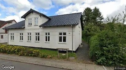 Boligudlejningsejendomme til salg i Uldum - Foto fra Google Street View Boligudlejningsejendomme til salg i Uldum - Foto fra Google Street View